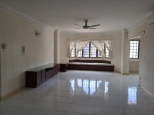 Spacious living room with white tiled floor, beige walls, and a window seat under a large bay window with floral curtains.