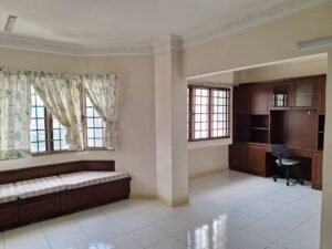 Bright living area with a long built-in wooden bench under two windows, cream curtains, and tiled floor.